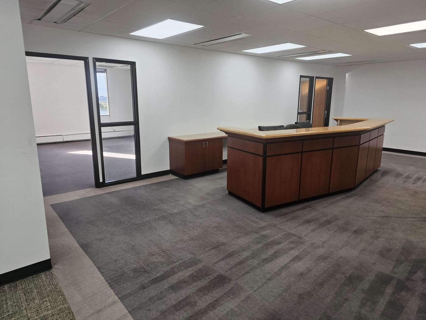 Floor 6 reception desk with private offices behind